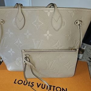 Monogram Empreinte Leather • Neverfull MM Turtledove Gray • pouch